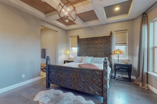 bedroom featuring multiple windows, dark hardwood / wood-style flooring, beamed ceiling, and coffered ceiling