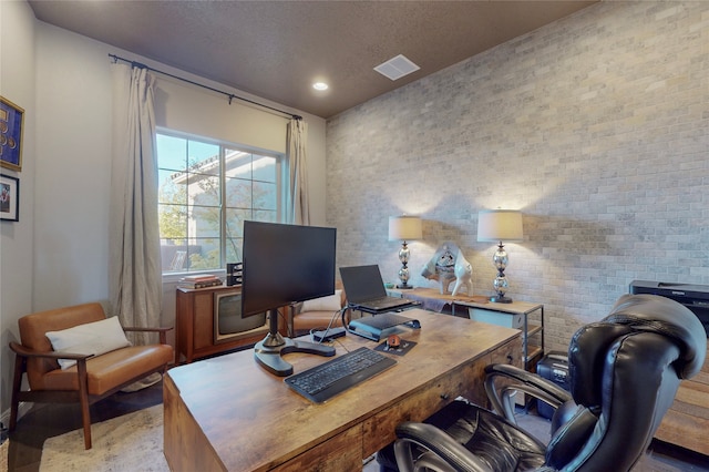 office featuring a textured ceiling