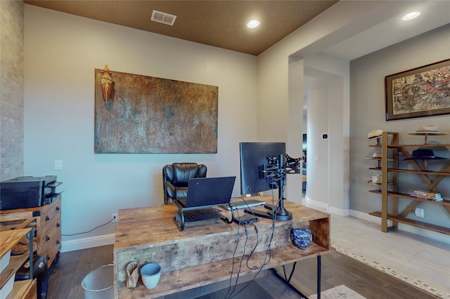 office with wood-type flooring