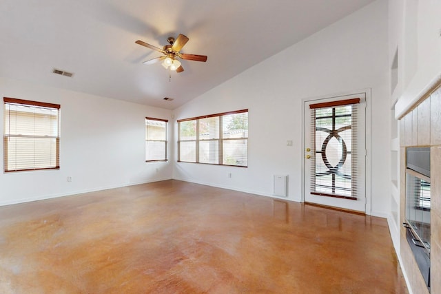 spare room featuring high vaulted ceiling and ceiling fan