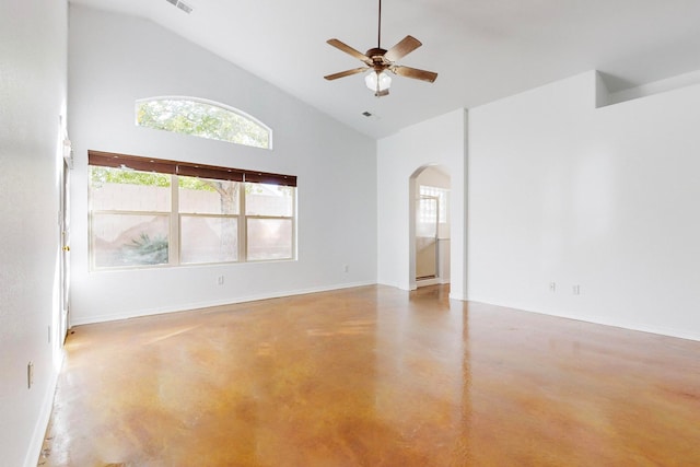 spare room featuring ceiling fan and high vaulted ceiling