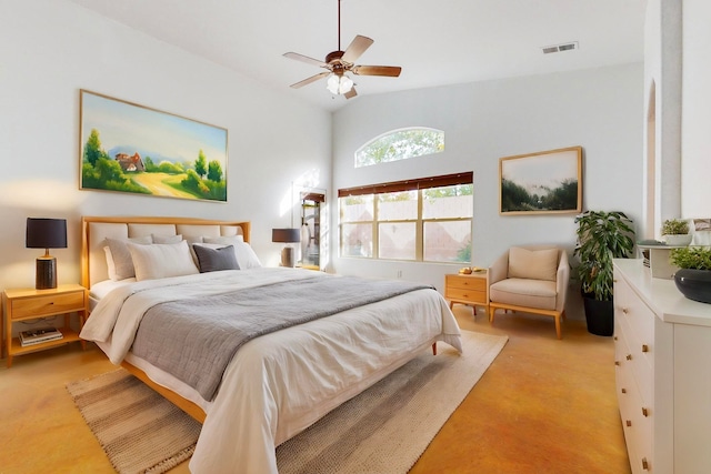 carpeted bedroom featuring ceiling fan and high vaulted ceiling