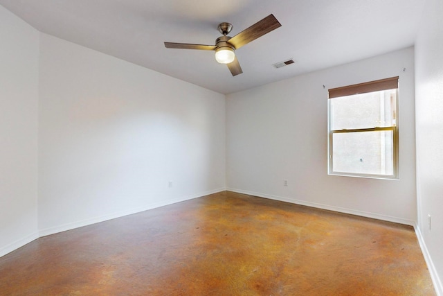 spare room with ceiling fan