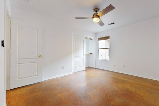 unfurnished bedroom featuring ceiling fan