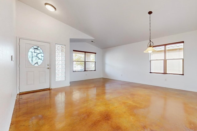 foyer entrance featuring vaulted ceiling