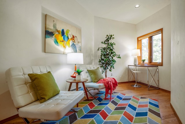 living area with wood-type flooring