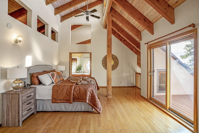 bedroom with access to outside, light hardwood / wood-style flooring, high vaulted ceiling, and beamed ceiling