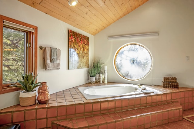 bathroom with a washtub, wood-type flooring, wood ceiling, and vaulted ceiling