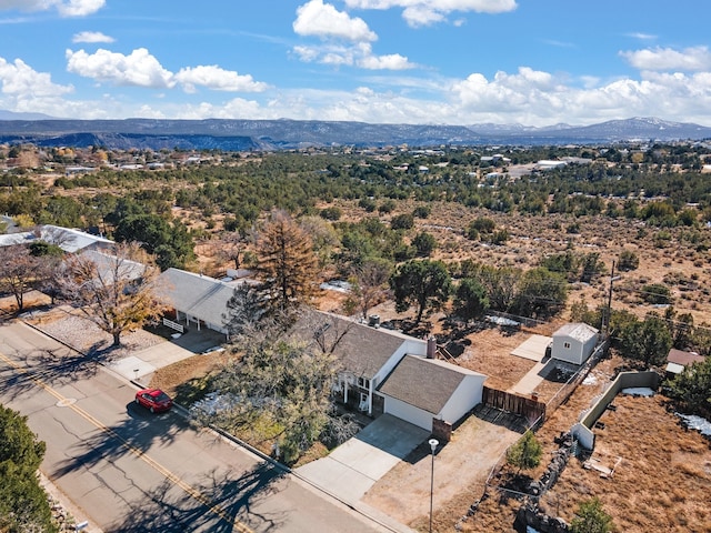 drone / aerial view featuring a mountain view