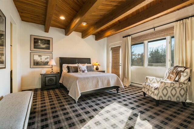 bedroom with beamed ceiling, wood ceiling, and a baseboard heating unit