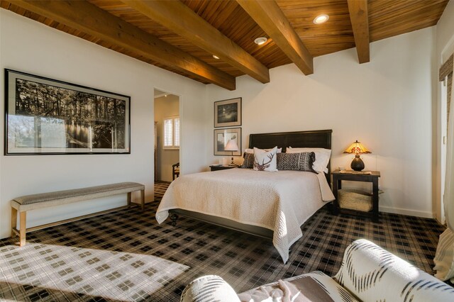 bedroom featuring beamed ceiling, carpet, and wooden ceiling