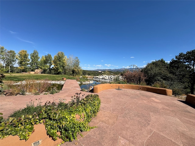 view of patio featuring a mountain view