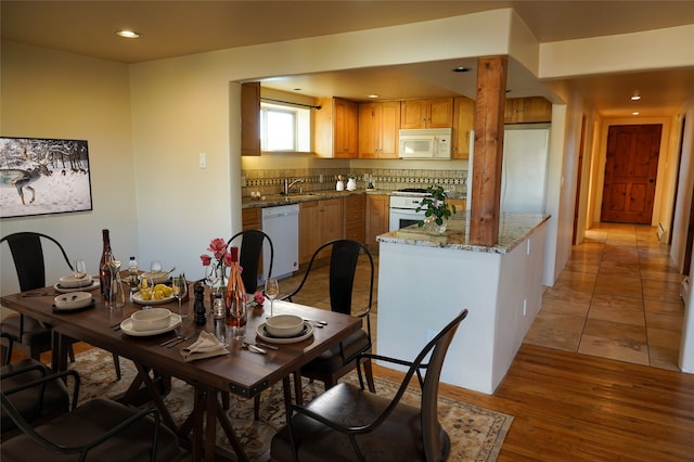 819 Fayette, Santa Fe, NM 87505 - dining room featuring light wood-style flooring and recessed lighting