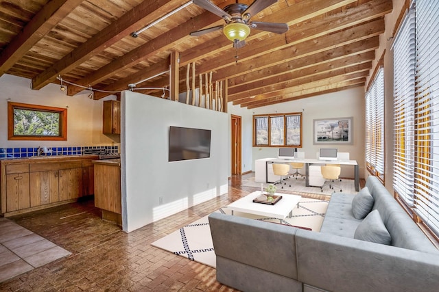 living room with wooden ceiling, ceiling fan, and lofted ceiling with beams