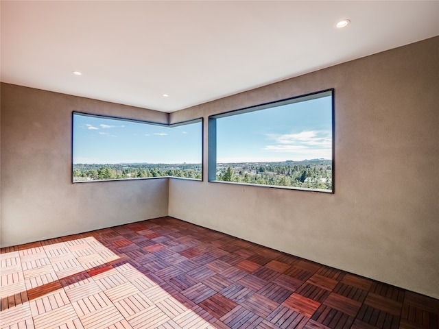 spare room featuring a wealth of natural light