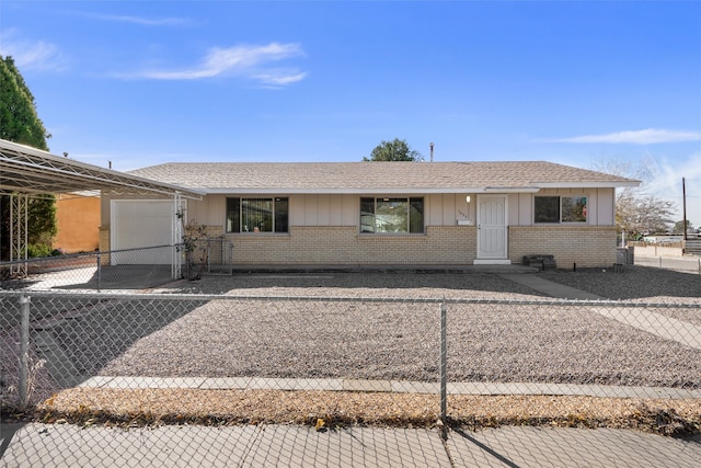 ranch-style home featuring a garage