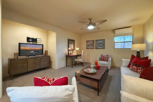 carpeted living room featuring a wall mounted air conditioner and ceiling fan