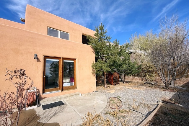 back of house featuring a patio area