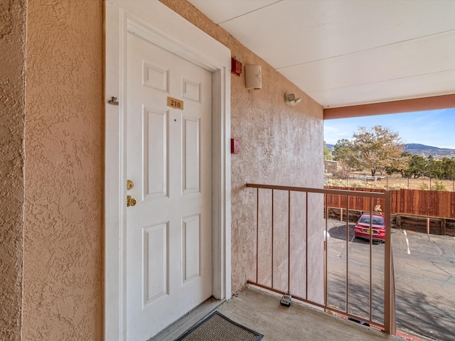 2501 Zia Rd Unit 10-210, Santa Fe, NM 87505 - entrance to property featuring stucco siding and a balcony