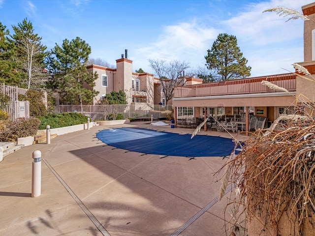 view of pool with a patio area