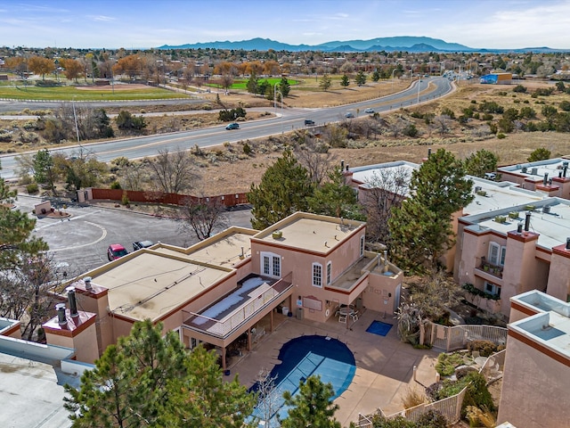 birds eye view of property featuring a mountain view