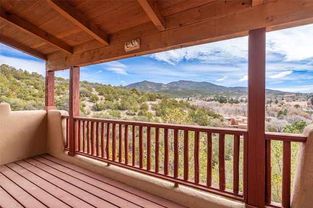 wooden terrace with a mountain view