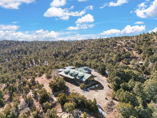 bird's eye view with a view of trees