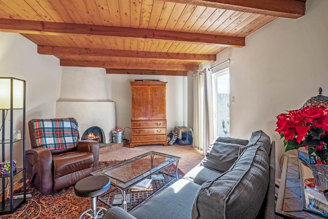 carpeted living room featuring beamed ceiling and wooden ceiling