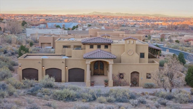 view of front of property featuring a garage