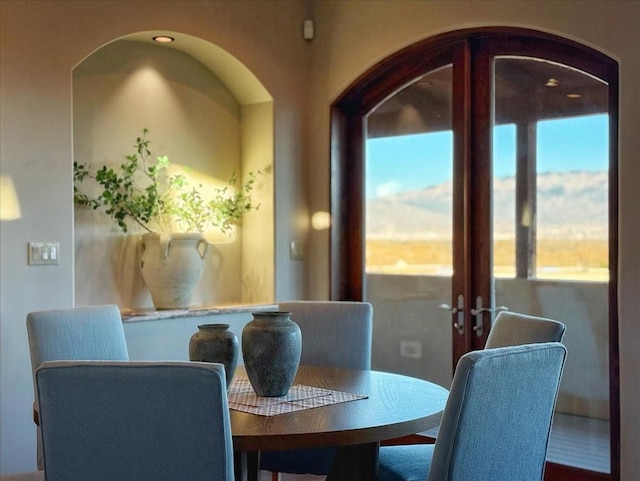 dining space featuring french doors