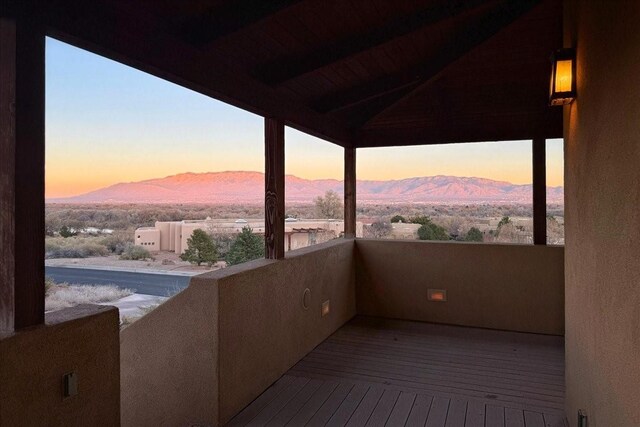 balcony at dusk with a mountain view