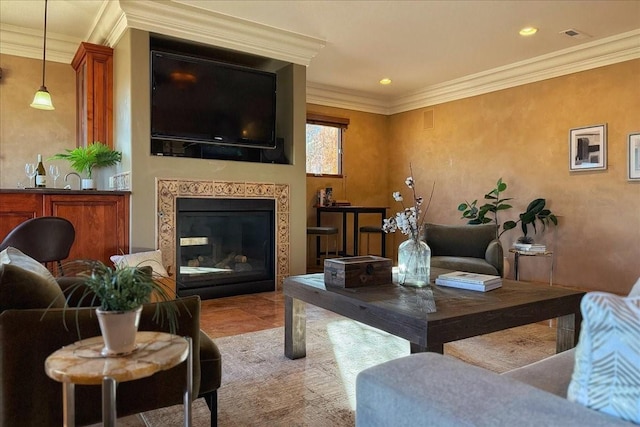 living room with a premium fireplace, crown molding, and light tile patterned floors