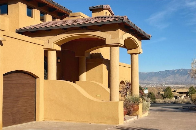 exterior space featuring a mountain view