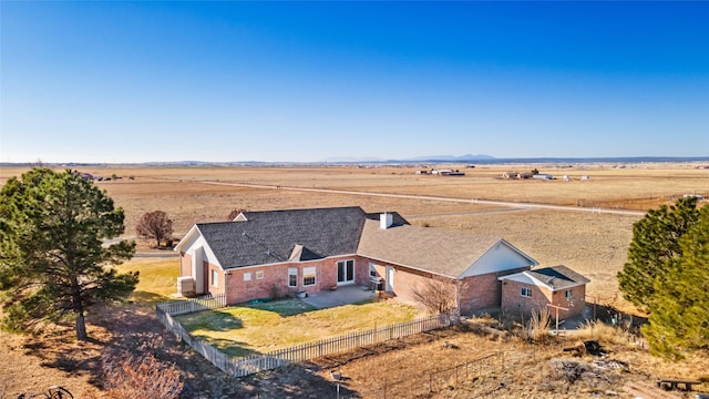 bird's eye view featuring a desert view and a rural view