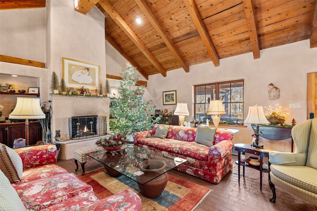 living room with high vaulted ceiling, wooden ceiling, and beam ceiling