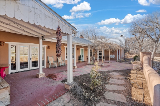 view of patio / terrace featuring french doors