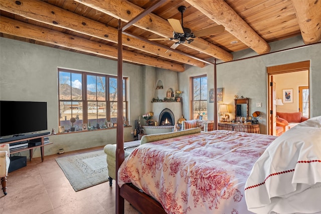 bedroom featuring beamed ceiling and wood ceiling