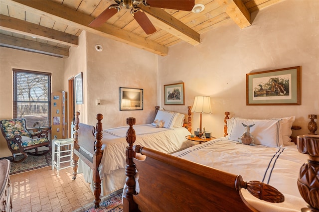 bedroom featuring beam ceiling and wooden ceiling