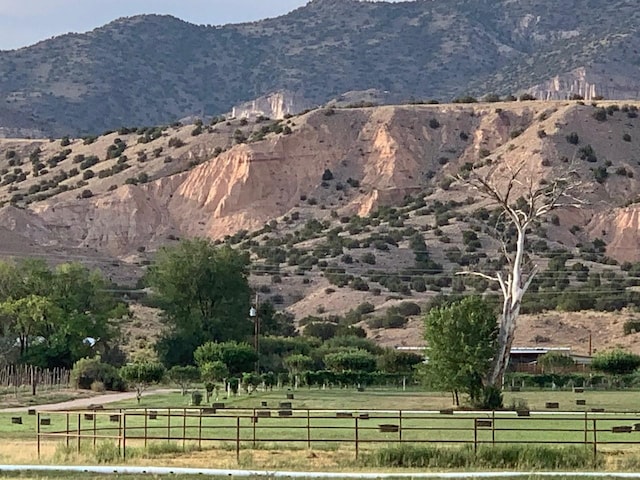 view of mountain feature with a rural view