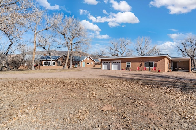 ranch-style home with a garage