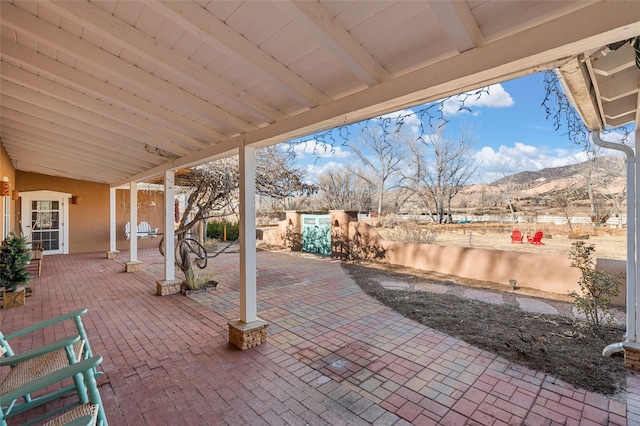 view of patio / terrace featuring a mountain view