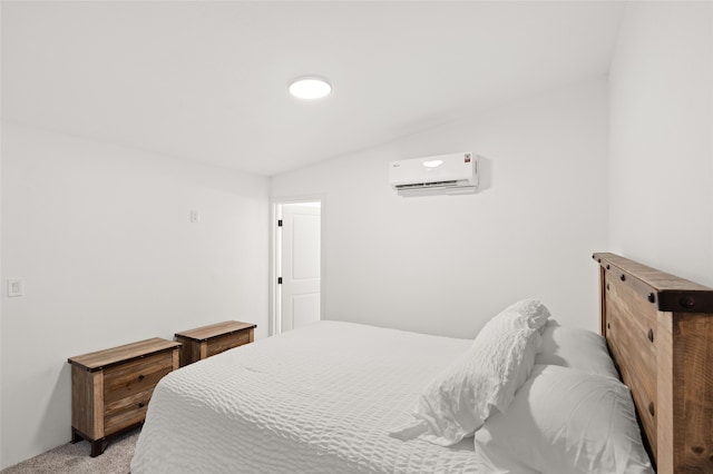 carpeted bedroom featuring lofted ceiling and an AC wall unit