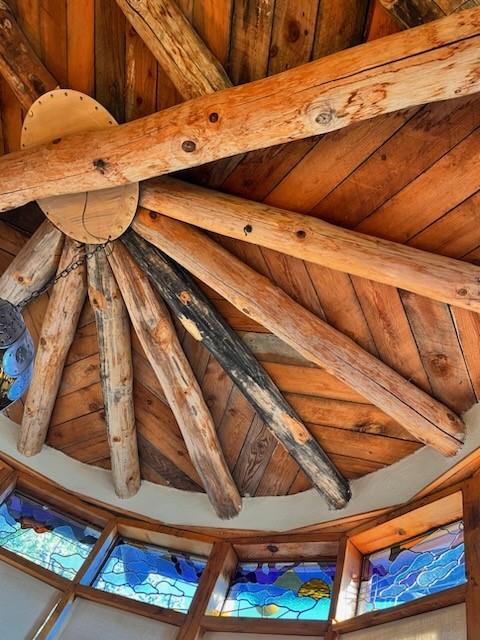 room details featuring beamed ceiling and wood ceiling