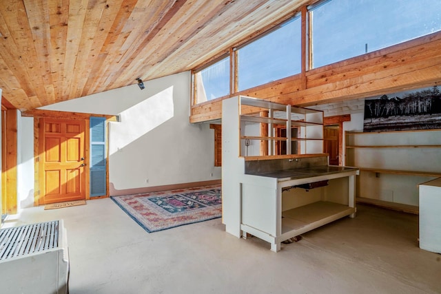 interior space featuring wooden ceiling and lofted ceiling