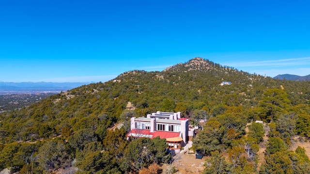 birds eye view of property featuring a mountain view