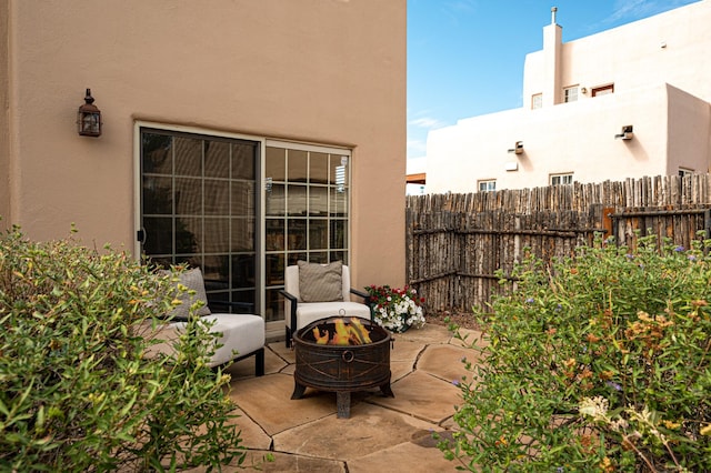 view of patio featuring a fire pit