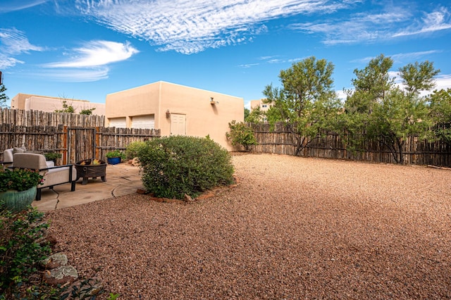 view of yard with a patio area