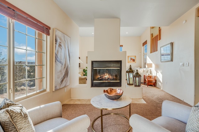 living room with carpet and plenty of natural light