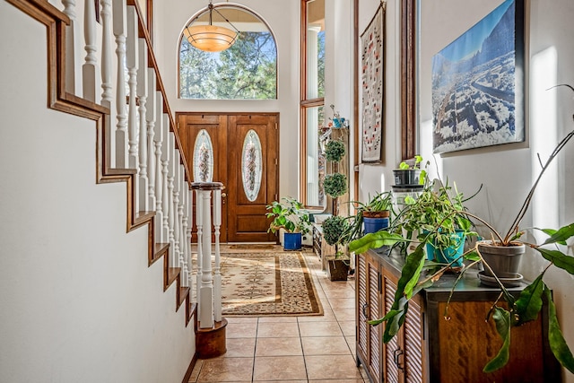 entryway featuring light tile patterned flooring