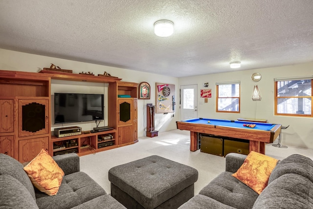 game room featuring carpet, a textured ceiling, and pool table